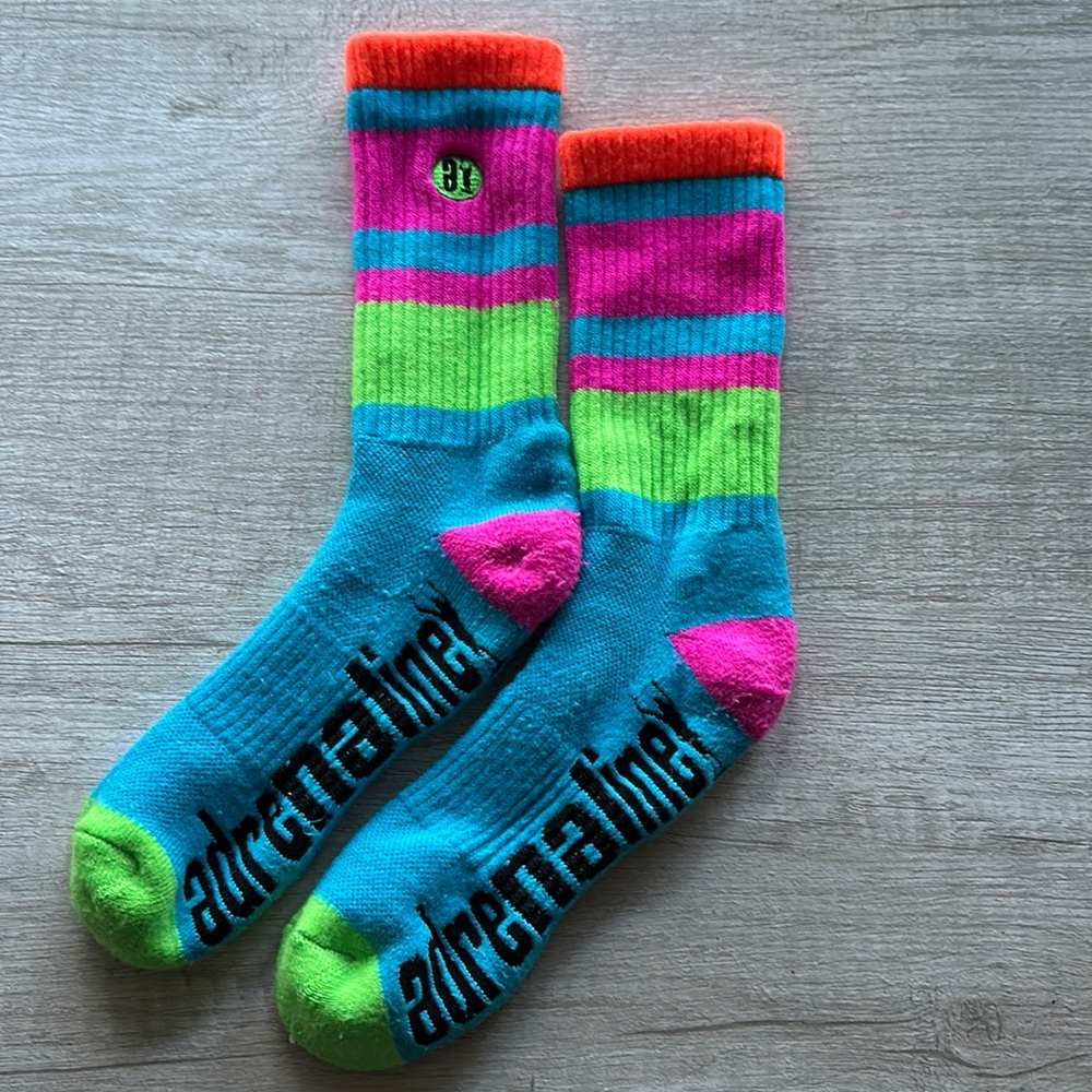 Adrenaline lacrosse socks from the mid 2010s. Guessing size S/M.